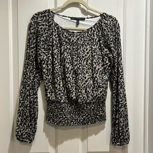 White house black market Camo print blouse.